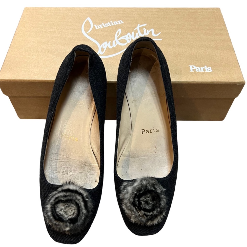 Louboutin flats with fur ball
